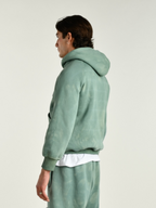 Hoodie uomo verde indossata dal modello vista laterale 