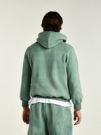 Hoodie uomo verde indossata dal modello vista posteriore 