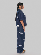 Pantalone mdcr denim donna indossato dalla modella vista laterale 